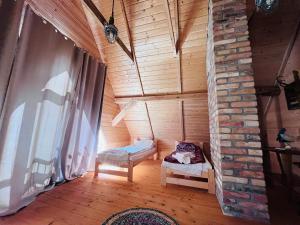 Φωτογραφία από το άλμπουμ του Wioska Mnicha - Dom na końcu σε Knyszyn