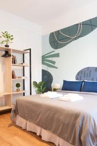 a bedroom with a bed with a basketball mural on the wall at Fliphaus Mansion Paz B - 10 pax Deluxe House Belgrano in Buenos Aires