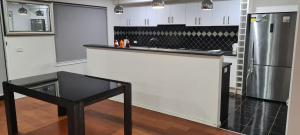 Η κουζίνα ή μικρή κουζίνα στο Budget Friendly Stay