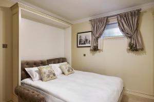 Postel nebo postele na pokoji v ubytování Maison des Barons + 79 fotografií