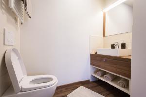 Baðherbergi á Hotel Pomaranča