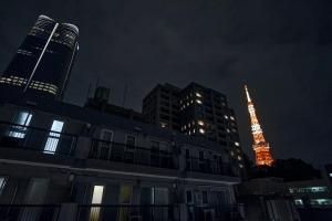 a view of the eiffel tower at night at Hotel-Mercurius-Azabujuban-RB in Tokyo