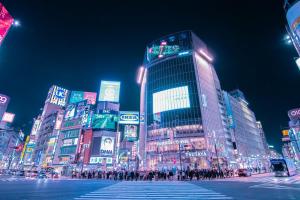 a group of buildings in a city at night at Hotel-Mercurius-Azabujuban-RB in Tokyo