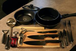 a group of kitchen utensils on a cutting board at Hotel-Mercurius-Azabujuban-RB in Tokyo