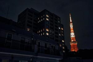 an image of the eiffel tower lit up at night at Hotel-Mercurius-Azabujuban-RB in Tokyo