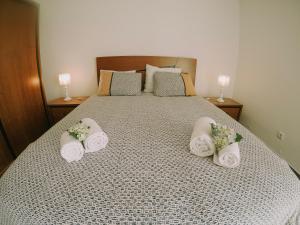 Ένα ή περισσότερα κρεβάτια σε δωμάτιο στο Casa Analino