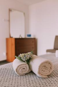 Ένα ή περισσότερα κρεβάτια σε δωμάτιο στο Casa Analino