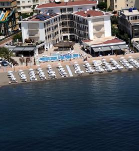 an aerial view of a resort with a pool and chairs at Pasa Garden Beach in Marmaris