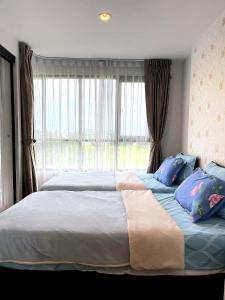 Postel nebo postele na pokoji v ubytování 中央公寓 1bedroom Centrio 804 Condominium 211