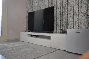 TV a/nebo společenská místnost v ubytování Eden Borbonico