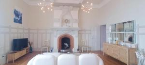 Μια τηλεόραση ή/και κέντρο ψυχαγωγίας στο Villa Dilecta - Superbe vue mer - garage