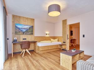 Posteľ alebo postele v izbe v ubytovaní Hotel Alt Vent Tyrol
