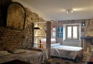 Postel nebo postele na pokoji v ubytování Casa della Dama