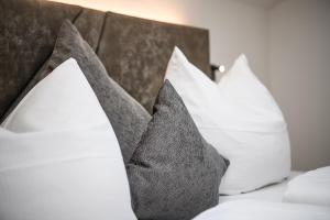 Postel nebo postele na pokoji v ubytování Hotel Hubertushof
