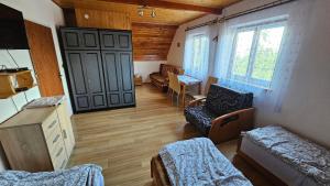 a room with a room with a living room at Agroturystyka na szlaku in Lubomierz