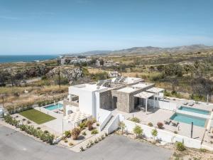 an aerial view of a villa with a swimming pool at Kiotari Fresh in Kiotari