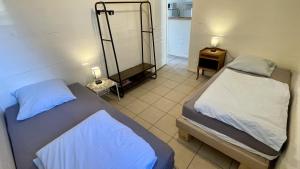 Postel nebo postele na pokoji v ubytování M2 Parking Wifi 1 à 3 pers 1 chambre, 1 lit de 180 ou 2 de 90, 1 canapé 120