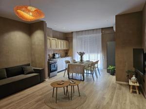 Η κουζίνα ή μικρή κουζίνα στο Amber Sand Apartments