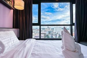 Ένα ή περισσότερα κρεβάτια σε δωμάτιο στο 2 Bed Room At Excellent Location - Pattaya Central +62 φωτογραφίες