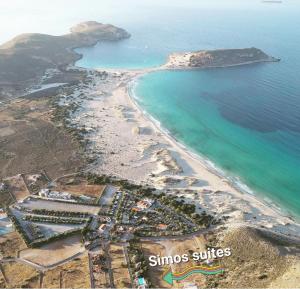 an aerial view of a beach next to the ocean at Simos suites in Elafonisos