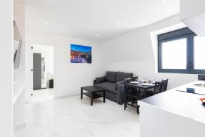 a living room with a couch and a table at Moderne F2 proche ORLY, Paris in Paray-Vieille-Poste