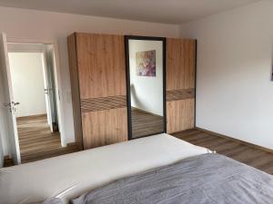 Postel nebo postele na pokoji v ubytování Kegelspiel Apartments