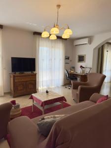 TV a/nebo společenská místnost v ubytování Apartman Ostrea ***
