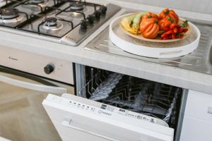 A kitchen or kitchenette at Paradise house - Oasis