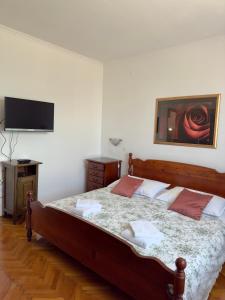 Postel nebo postele na pokoji v ubytování Apartman Ostrea ***