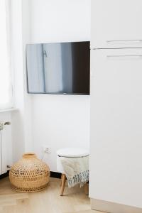 A television and/or entertainment centre at Paradise house - Oasis