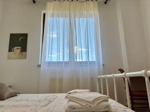 Postel nebo postele na pokoji v ubytování Apartman Ostrea ***