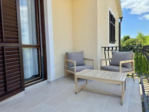 Balkón nebo terasa v ubytování Apartman Ostrea ***
