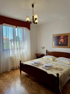 Postel nebo postele na pokoji v ubytování Apartman Ostrea ***