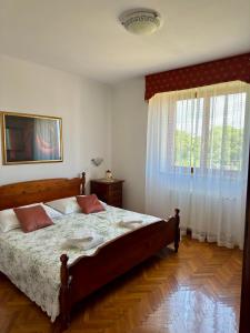 Postel nebo postele na pokoji v ubytování Apartman Ostrea ***
