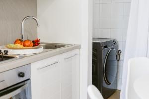 A kitchen or kitchenette at Paradise house - Oasis