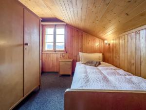 Postel nebo postele na pokoji v ubytování Hotel Alpfrieden