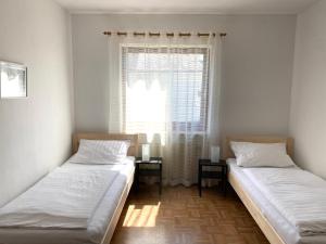 Postel nebo postele na pokoji v ubytování Zum Lahnfelsen Gräveneck