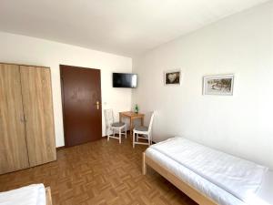 Postel nebo postele na pokoji v ubytování Zum Lahnfelsen Gräveneck