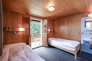 Postel nebo postele na pokoji v ubytování Hotel Alpfrieden