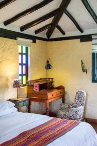 Ένα ή περισσότερα κρεβάτια σε δωμάτιο στο Casa San Nicolas