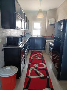 Η κουζίνα ή μικρή κουζίνα στο Red Chalet +2 φωτογραφίες