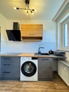 Køkken eller tekøkken på REGENCY Apartments - City Wohnung I Balkon I WLAN I Netflix I Parkplätze