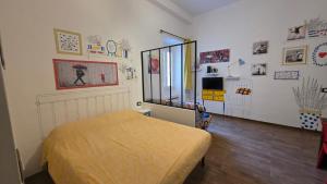 Posteľ alebo postele v izbe v ubytovaní CASA DI SILVIA a PORTA PIA