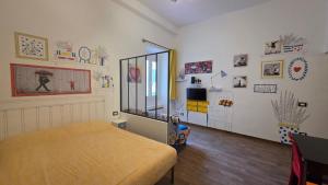 Posteľ alebo postele v izbe v ubytovaní CASA DI SILVIA a PORTA PIA