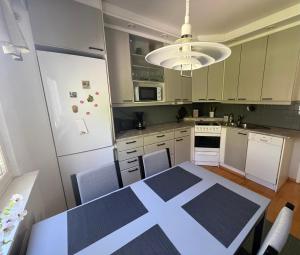 Køkken eller tekøkken på Cityflat by Travel Center + 10 billeder