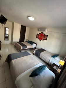 Postel nebo postele na pokoji v ubytování Casa Real