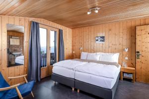 Postel nebo postele na pokoji v ubytování Hotel Alpfrieden