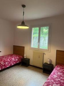 Postel nebo postele na pokoji v ubytování Eze village bas de villa jardin vue mer