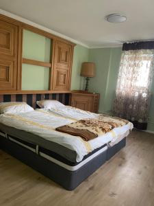 Postel nebo postele na pokoji v ubytování Erdgeschosswohnung mit separatem Eingang