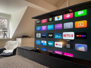 a wall with a bunch of apps on it at Annahoeve Venlo, Landhaus 220 qm in Venlo